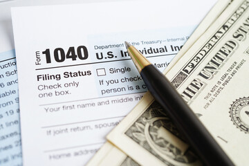 Obraz premium Tax form 1040 U.S. Individual Income Tax Return, business finance concept.