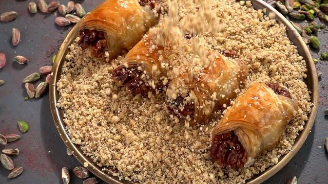 Traditional turkish baklava pistachio pastry. Dilberdudagi, ozel kesim baklava, cikolatali baklava, fistikli baklava, katmer, fistikli kadayif, kattafi, fistik sarma, soguk baklava, midye baklava, cev