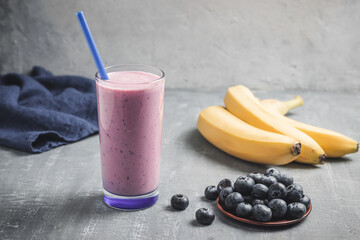 Blueberry and banana smoothie drink in a glass, healthy eating concept