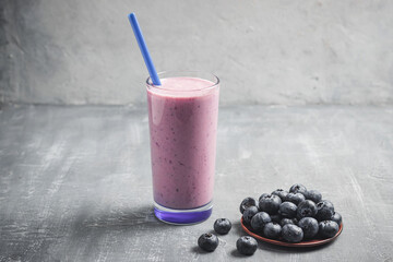 Blueberry smoothie drink in a glass, healthy eating concept