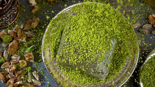 Traditional turkish baklava pistachio pastry. Dilberdudagi, ozel kesim baklava, cikolatali baklava, fistikli baklava, katmer, fistikli kadayif, kattafi, fistik sarma, soguk baklava, midye baklava, cev