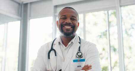 Healthcare, confidence and portrait of doctor with smile in office at hospital, black man in...