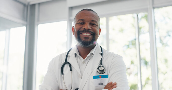 Healthcare, Confidence And Portrait Of Doctor With Smile In Office At Hospital, Black Man In Medical Job. Proud Man, Leader In Medicine With Support, Trust And Leadership At Clinic In South Africa.