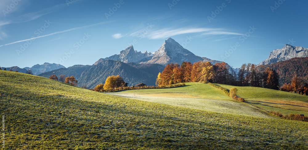 Fototapete Amazing nature scenery in mountain. Beautiful natural landscape in the summer morning. Mountain valley with fresh green grass and Watzmann Mountain ranges. Amazing nature Background. creative image