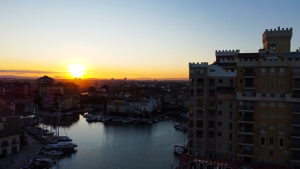 aerial view flight over city Alboraya Port Saplaya water channels yachts Spain evening sunset