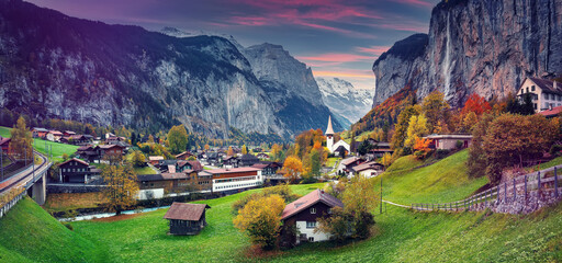 Scenic view on mountain highland. Panorama view on Lauterbrunnen valley during sunset, Switzerland. Iconic location for landscape photographers. most popular place of travel and Outdoor vacations © jenyateua