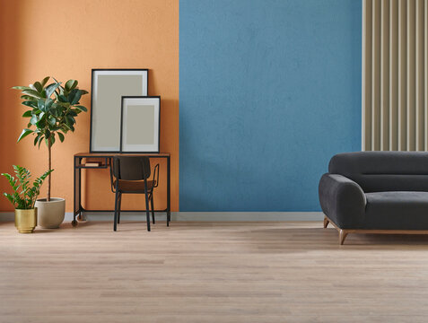 Modern working room interior home decoration, orange and blue textured wall background, vase of plant, bike.
