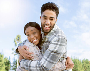 Couple, portrait smile and hug for summer vacation, travel or holiday break together outdoors. Happy man and woman hugging, smiling and enjoying traveling, trip or getaway in nature happiness