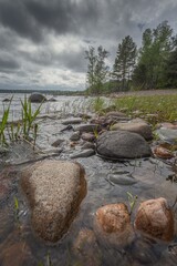 Fototapeta na wymiar rocky shores of Karelian lakes, forest lake