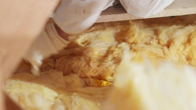 insulation of the roof and ceiling with glass wool