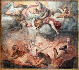 DOMODOSSOLA, ITALY - JULY 19, 2022: The fresco of Souls in the Purgatory in church Chiesa dei Santi...