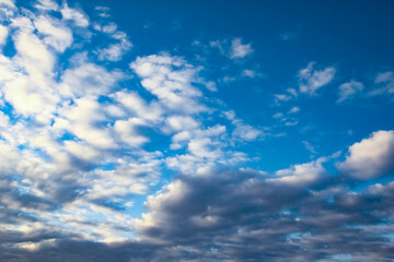 Fantastic soft white clouds against blue sky
