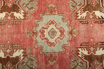 Textures and patterns in color from woven carpets