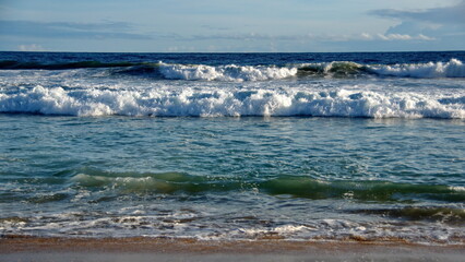 Waves breaking on the beach in Zipolite, Mexico