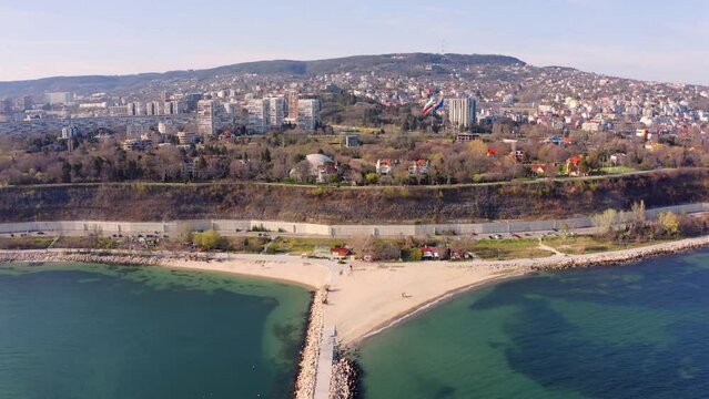 4k drone flight back footage (Ultra High Definition) of Varna port. Amazing seascape of Black sea, east coast of Bulgaria, Europe. Traveling concept background.