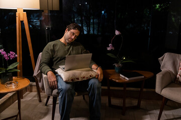 Brazilian man working at home