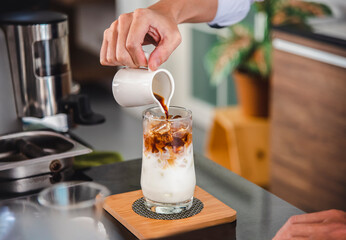 Male baristas, excellent iced coffee, service beyond expectations Serve customers in world famous coffee shops