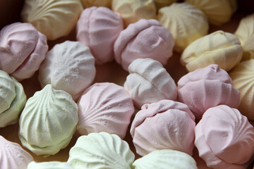 Marshmallow production. Fresh, sweet  marshmallows just cooked at a confectionery factory are sent for packing
