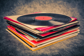 stack of vinyl records with music - 566623798