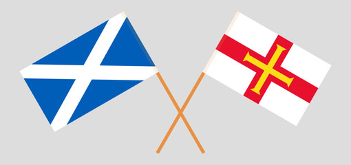 Crossed flags of Scotland and Bailiwick of Guernsey. Official colors. Correct proportion