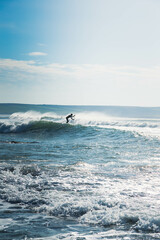 big wave surfer at sea
