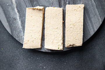 tofu soy product vegetable cheese healthy meal food snack on the table copy space food background rustic top view keto or paleo diet veggie vegan or vegetarian food
