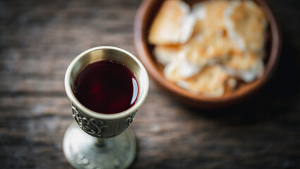 Concept of Eucharist or holy communion of Christianity. Eucharist is sacrament instituted by Jesus. during last supper with disciples. Bread and wine is body and blood of Jesus Christ of Christians. - obrazy, fototapety, plakaty