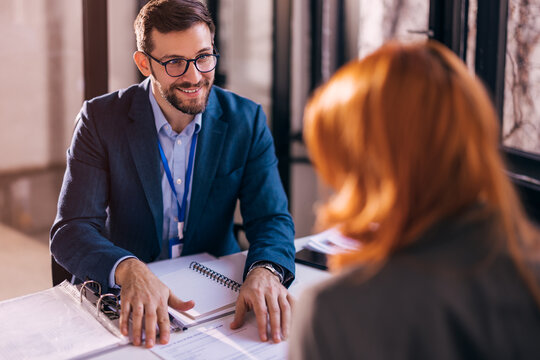 The Real Estate Agent Closes The Deal With The Client And They Sign The Contract.