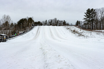 Obraz premium Sonwtubing in Horseshoe ski resort in Barrie, Ontario, Canada