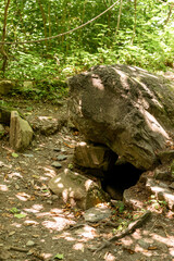Dolmens, structures made of monolithic stone slabs weighing several tons in Adlersky Krasnaya Polyana and district in summer 