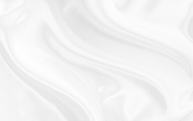 White gray satin texture that is white silver fabric silk background with beautiful soft blur pattern natural.