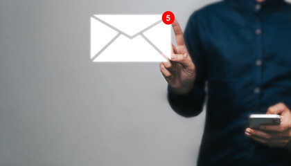 New email notification concept for business e-mail communication and digital marketing. Inbox receiving electronic message alert. business people touch on email in virtual screen. internet technology.