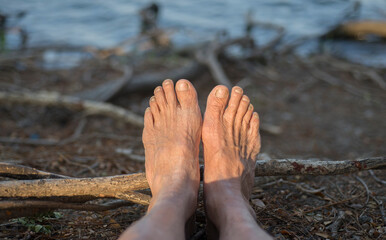 feet person elderly on the beach