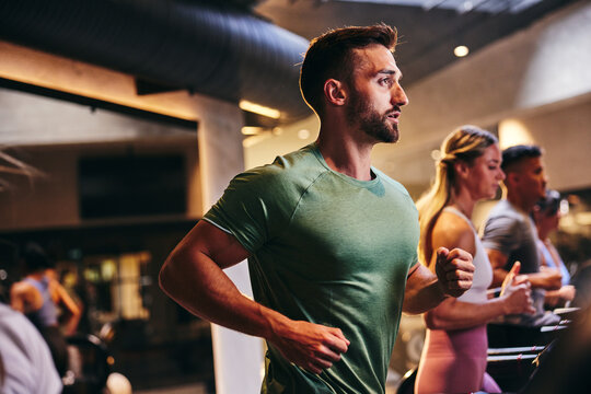 Man exercising on a gym treadmill