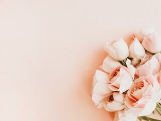 Obraz na płótnie Canvas Bouquet pale pink ranunculus flowers light background.