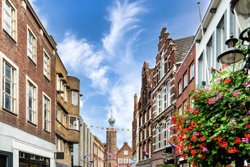Shopping street in Venlo with Flowers on the street lamps