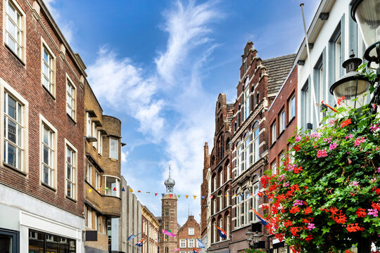 Shopping street in Venlo with Flowers on the street lamps