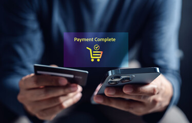 Shopping online payment concept. Man hand using smart phone with cart delivery icon, banking and online shopping via banking mobile app, E-transaction and financial technology.