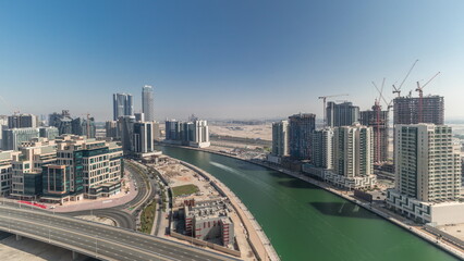 Fototapeta na wymiar Skyscrapers at the Business Bay aerial all day in Dubai, United Arab Emirates