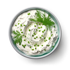 Bowl of sour cream dip sauce with herbs isolated on white background, top view