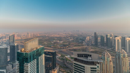 Panorama of Dubai Marina with JLT skyscrapers and golf course , Dubai, United Arab Emirates.