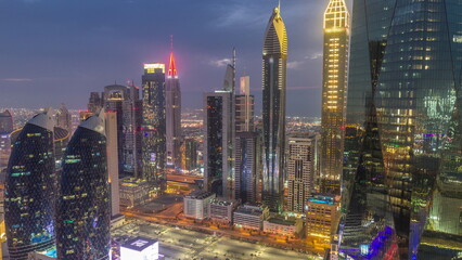 Naklejka premium Financial center of Dubai city with luxury skyscrapers day to night , Dubai, United Arab Emirates