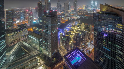 Fototapeta na wymiar Panorama of futuristic skyscrapers in financial district business center in Dubai all night