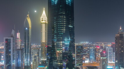 Financial center of Dubai city with luxury skyscrapers all night , Dubai, United Arab Emirates