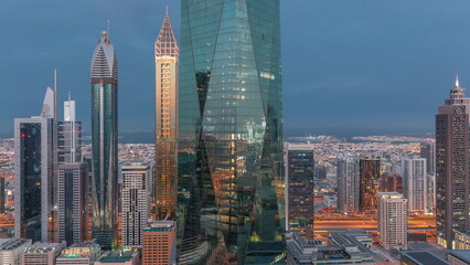 Financial center of Dubai city with luxury skyscrapers night to day , Dubai, United Arab Emirates