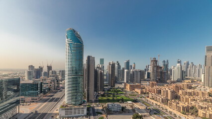 Fototapeta premium Panorama showing Dubai's business bay towers aerial morning . Rooftop view of some skyscrapers