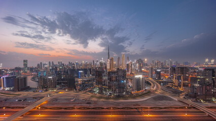 Fototapeta na wymiar Panoramic skyline of Dubai with business bay and downtown district day to night .