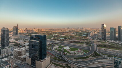 Panorama showing Dubai marina and JLT skyscrapers along Sheikh Zayed Road aerial .