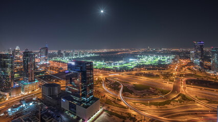 Fototapeta na wymiar Panorama showing Dubai marina and JLT skyscrapers along Sheikh Zayed Road aerial night .