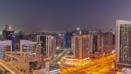 Fototapeta premium Skyscrapers at the Business Bay in Dubai aerial day to night , United Arab Emirates